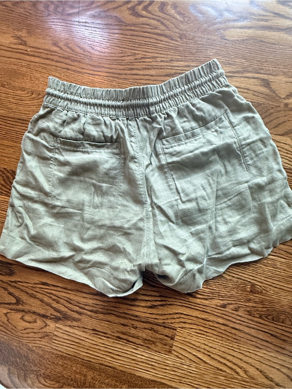 Athleta Olive Green Linen shorts. Size S. Zip pockets. Elastic waist/ tie. EUC - Picture 4 of 7